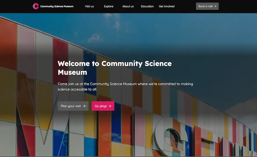 Screenshot of Community Science Museuem website featuring a navigation bar and call-to-action buttons for parents and children.